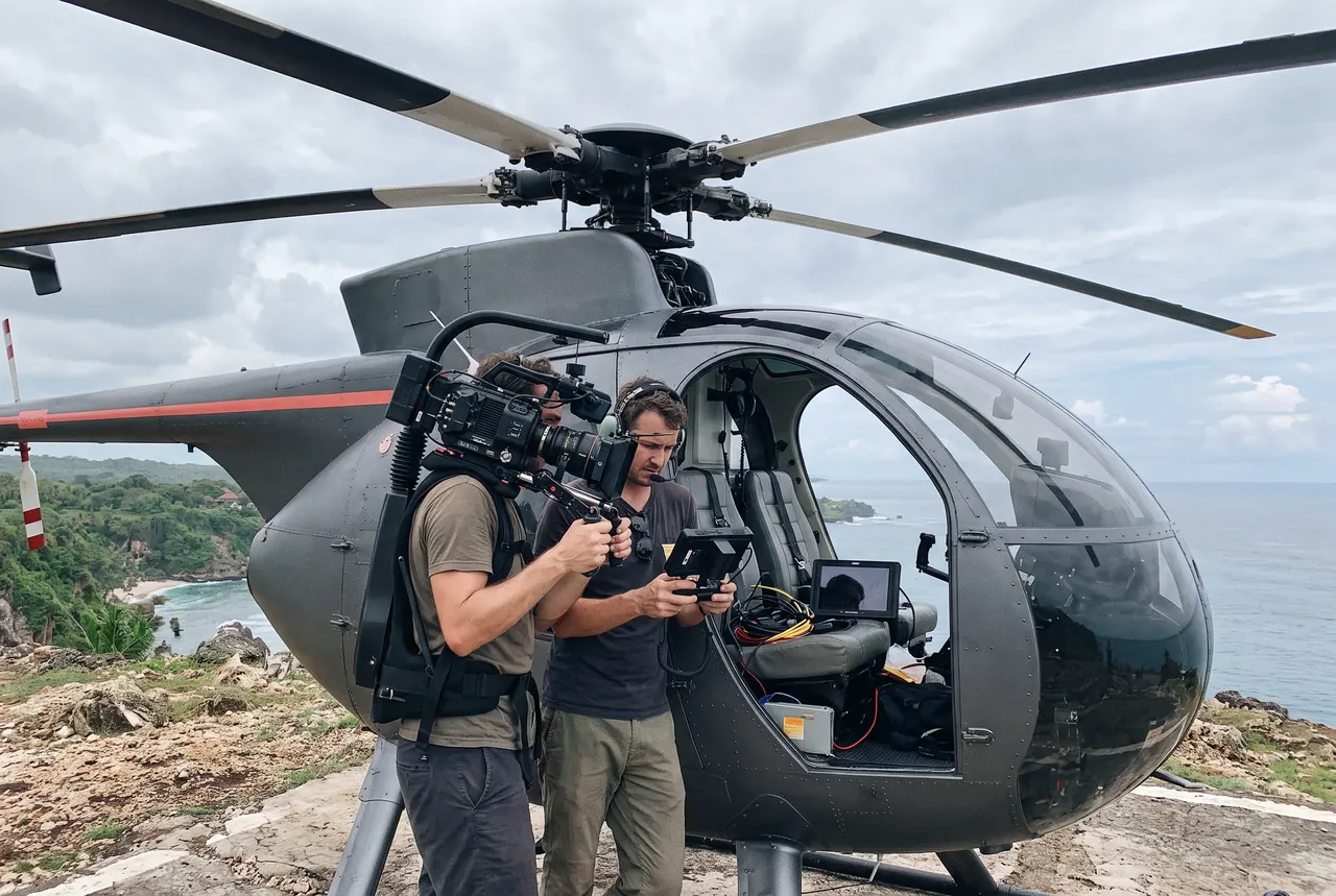 Film crew preparing an aerial shoot from a helicopter in Bali