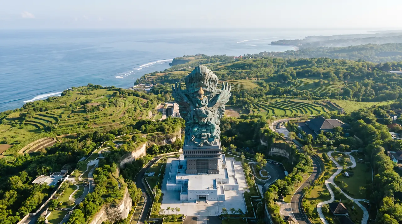 Garuda Wisnu Kencana statue on Bali's Bukit peninsula from a helicopter