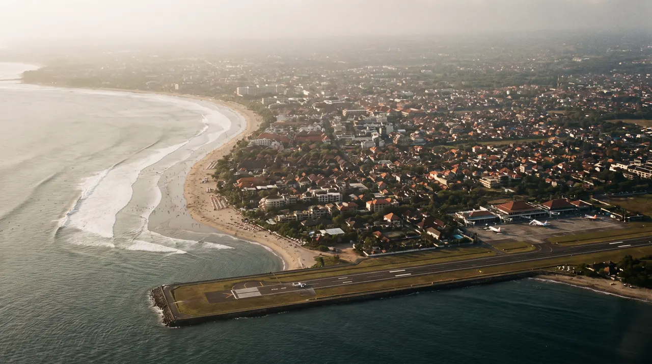 Kuta beach and the Ngurah Rai airport runway seen from the air in Bali