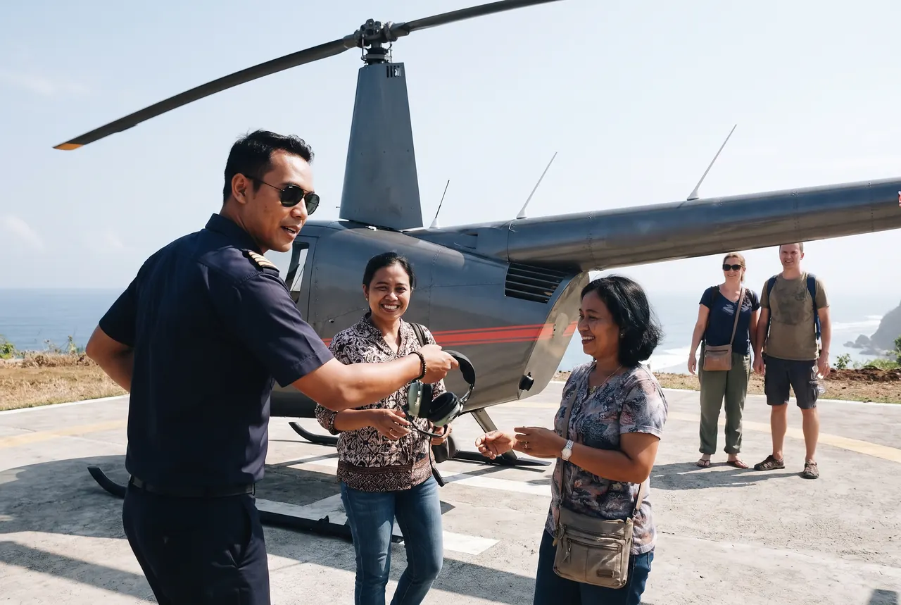 Pilot briefing guests beside a helicopter on a private helipad in south Bali