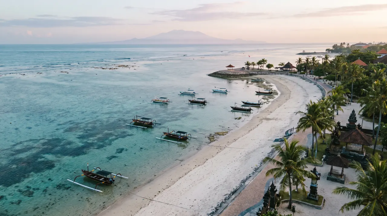 Sanur beach reef and outrigger boats from a helicopter in Bali